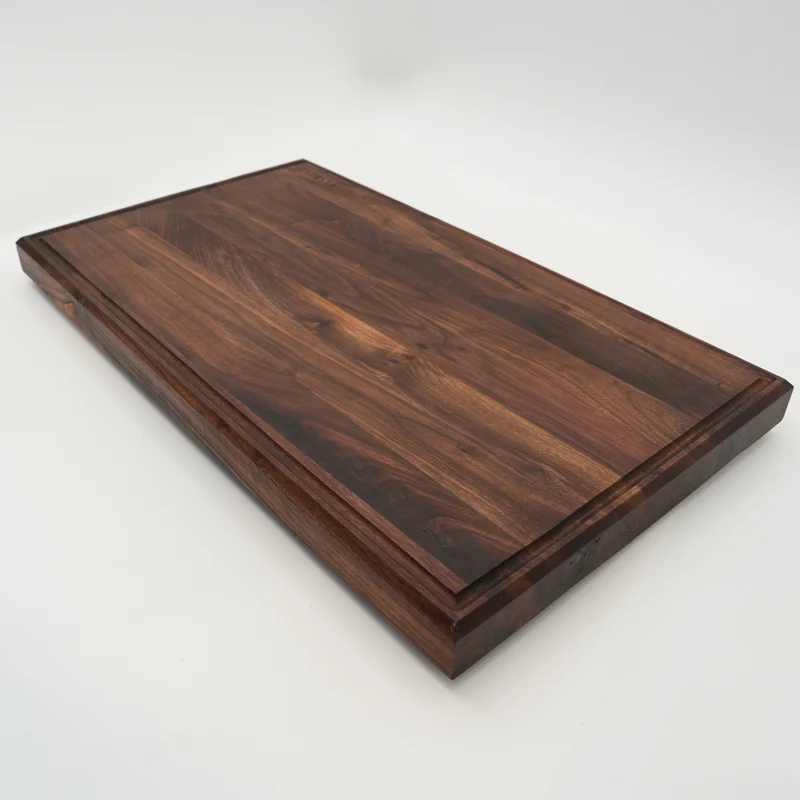 BABOSSA | Nussbaum Schneidebrett XL | Naturkante | Saftrille | 70x40x6 cm